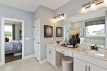Primary suite features double vanities, tile floors, and tiled shower or tiled shower/garden tub at NO cost!
