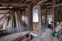 Upper area of barn accessed by permanent stairs.