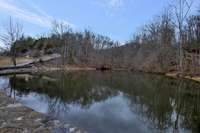 Spring fed lake provides water supply to these homes.