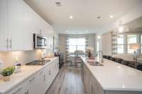 Open Kitchen with quartz countertops (model home)