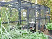 Totally Enclosed Garden with Raised Beds