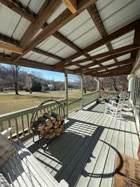 Front porch made for sitting to take in the breathtaking views