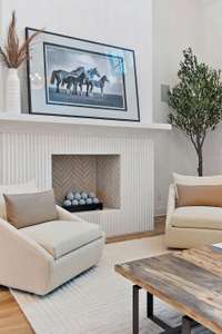 Stunning fluted fireplace.