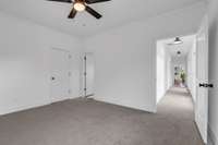 Bedroom 3 with door to hallway of windows and natural light