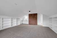 Bonus Room with brand new carpet, built-ins, brick feature and wet bar