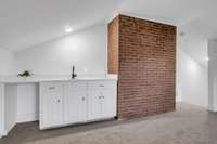 Brick Feature with beautiful wet bar