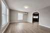 Arched doorway leading to kitchen