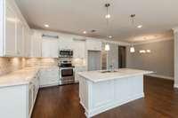 Azalea Plan Kitchen  **Photos of a model home, some upgrades shown