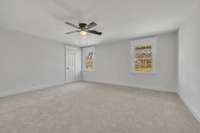 3rd bedroom located on 2nd floor. Very large room with large walk-in closet and custom shelving.