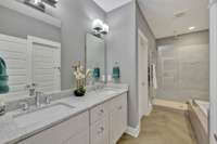 Primary Bath Suite equipped with a heated towel rack, right next to the shower!