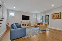 Formal gathering room that features double doors, opening out to the screened in back porch-a host or hostesses dream!