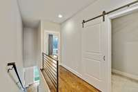 A sliding door closes off the laundry room