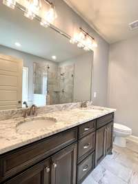 Granite Countertops in Primary Bath as Well.