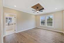 Primary bedroom with gorgeous ceiling