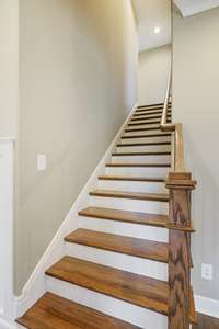 Wood stairs leading upstairs