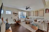 Nice size Living Room with original wood flooring.