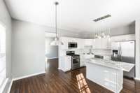 Breakfast nook area. Formal Dining room located through the doorway next to the Gas range!