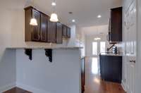 Kitchen entrance (stool seating area)