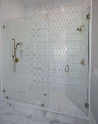 Stunning Spa-like Shower.  *this home is virtually staged.  Built by: Schumacher Homes, LLC