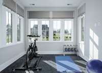 Bright and Airy Home Gym.    Built by: Schumacher Homes, LLC. *this home is virtually staged.