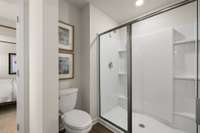 Luxury primary bathroom with walk-in shower. (Not actual home)