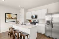 Beautiful kitchen with island. (Not actual home)