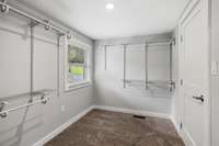 This EXTRA large walk-in closet in located in the primary bedroom and has plenty of room for your wardrobe.