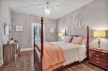 Guest bedroom on the main level with a walk in closet ** this chandelier does not remain **