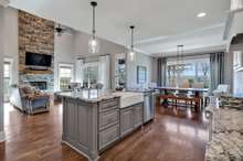 Lovely neutral kitchen with a very generous island / breakfast bar ... excellent storage!