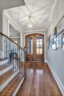 Home is full of high end finishes including the 8' Mahogany Doors  ..... Shows beautifully and feels like a brand new home!