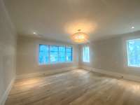 Lower level bedroom, sunny, bright, and spacious with ensuite, full bathroom and large closet