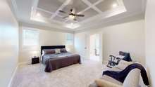 Unique Master Bedroom ceiling is coffered and fun to look at!