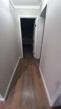 Hallway from Kitchen to Large Laundry Room