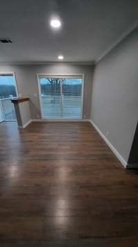 View from Kitchen to Dining Room and front entrance