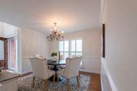 Formal Dining room situated right off the kitchen with snowbound cherwell and a beautiful view!