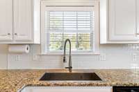 Sink window overlooking the backyard