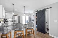 Custom barn door covers pantry