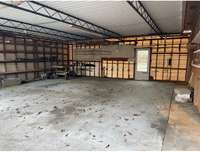 Cleaned out 3 car covered car port ready for your cars or projects directly outside door to Great Room/Hobby Room.