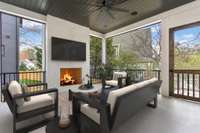 Gorgeous screened porch with woodburning fireplace