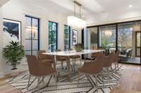 Spacious dining room off kitchen and leading to screened porch.