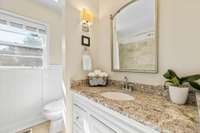 2nd Full bath has natural light, upgraded commode and extra storage.