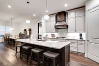 Beautiful Kitchen with Gas cooktop, Island and double ovens