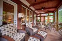 Beautiful screened porch for relaxing or alfresco dining.