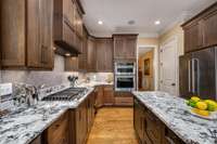 Sleek kitchen Love this black-and-white granite with strong design component!  Island base is a contrasting black