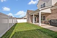 Imagine enjoying a warm spring/summer day relaxing and grilling on the extended concrete patio you see here! The owners added the vinyl privacy fence so this space is ready for you to move in and enjoy!