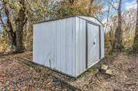 The metal storage shed adds another touch of convenience.