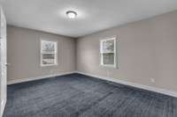 Brand new carpet adorns the floors in both bedrooms.