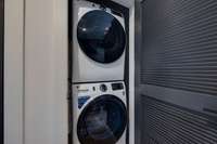 Laundry in your condo. Brand new appliances, tv's  convey with the property