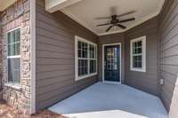 Covered patio.  Option to screen.  Great place to create a seating area.