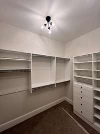 Wood shelving and drawers in. Primary room